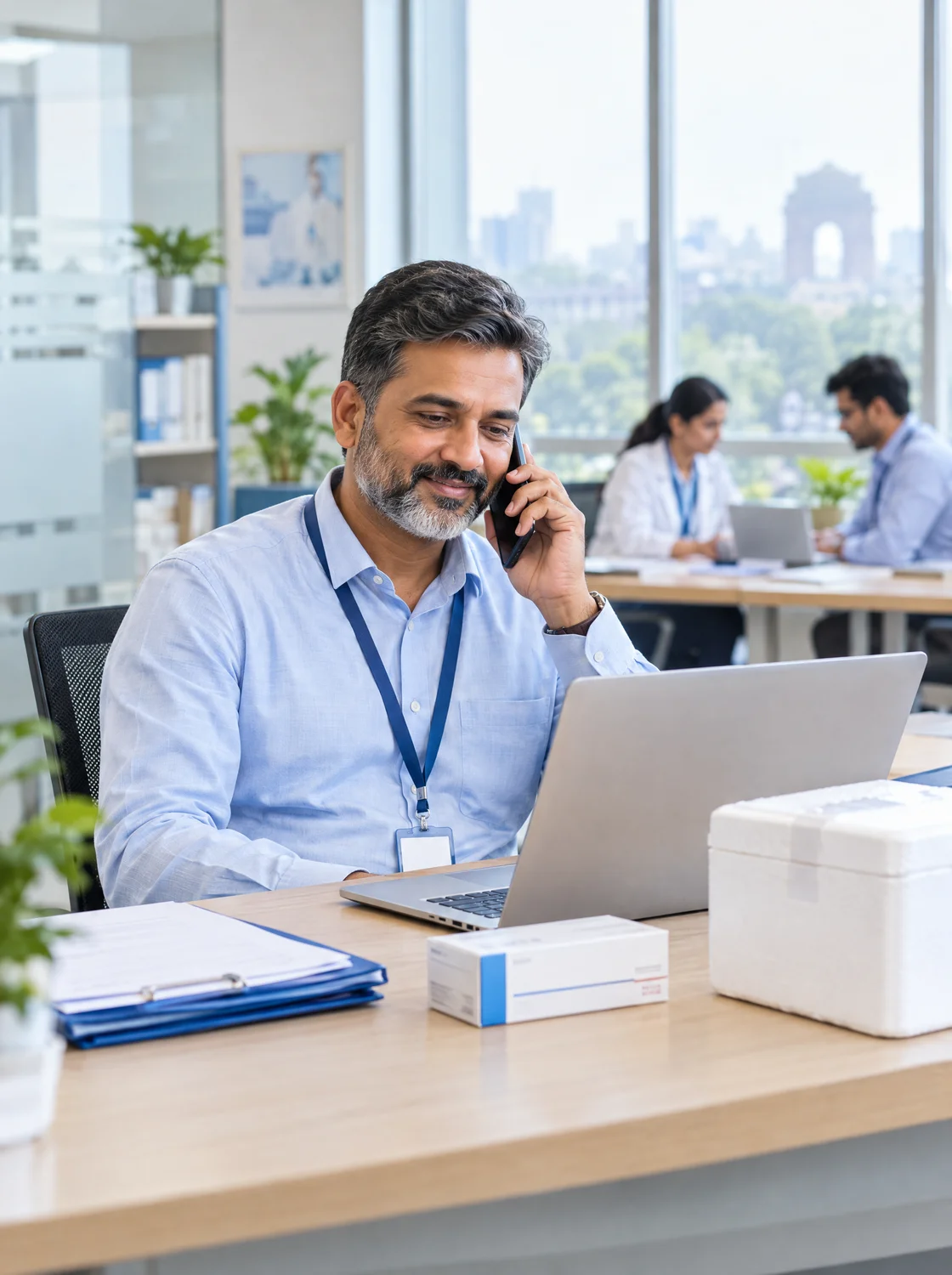 A doctor coordinating a request by phone A doctor coordinating a request by phone